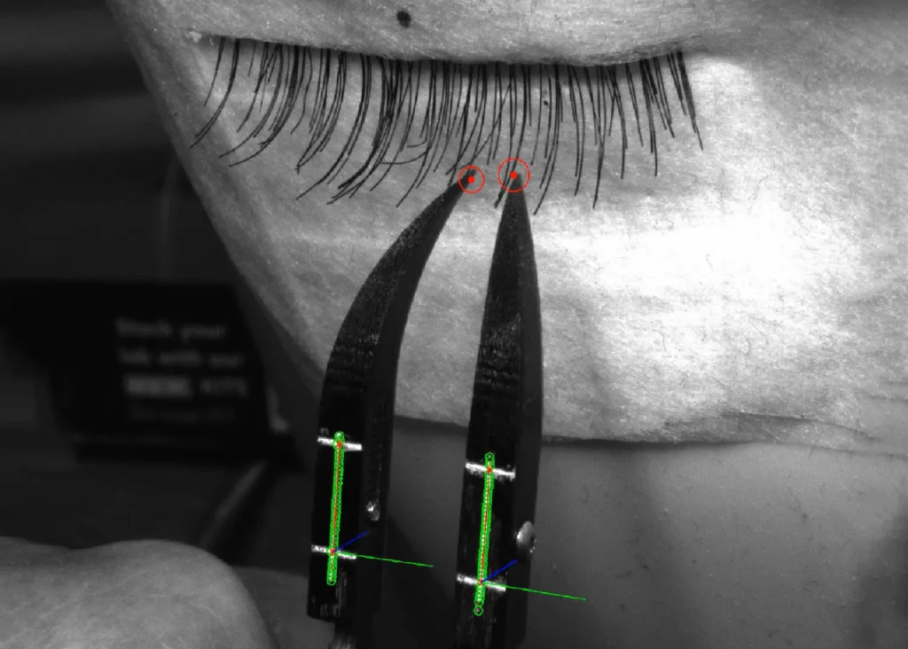 Close-up of LUUM's prototype visual system tracking the position of an eyelash extension.